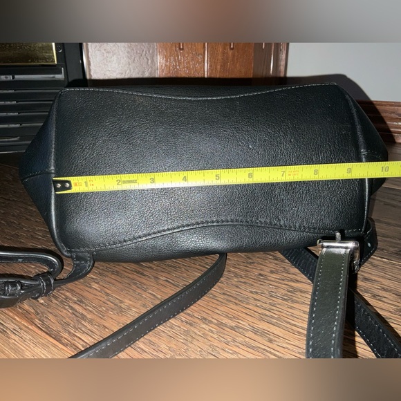 Michael Kors Raven Medium Pebbled Backpack
Black leather with silver hardware - Picture 12 of 13